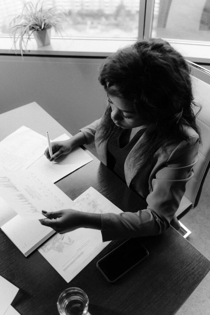 a woman sitting at the table